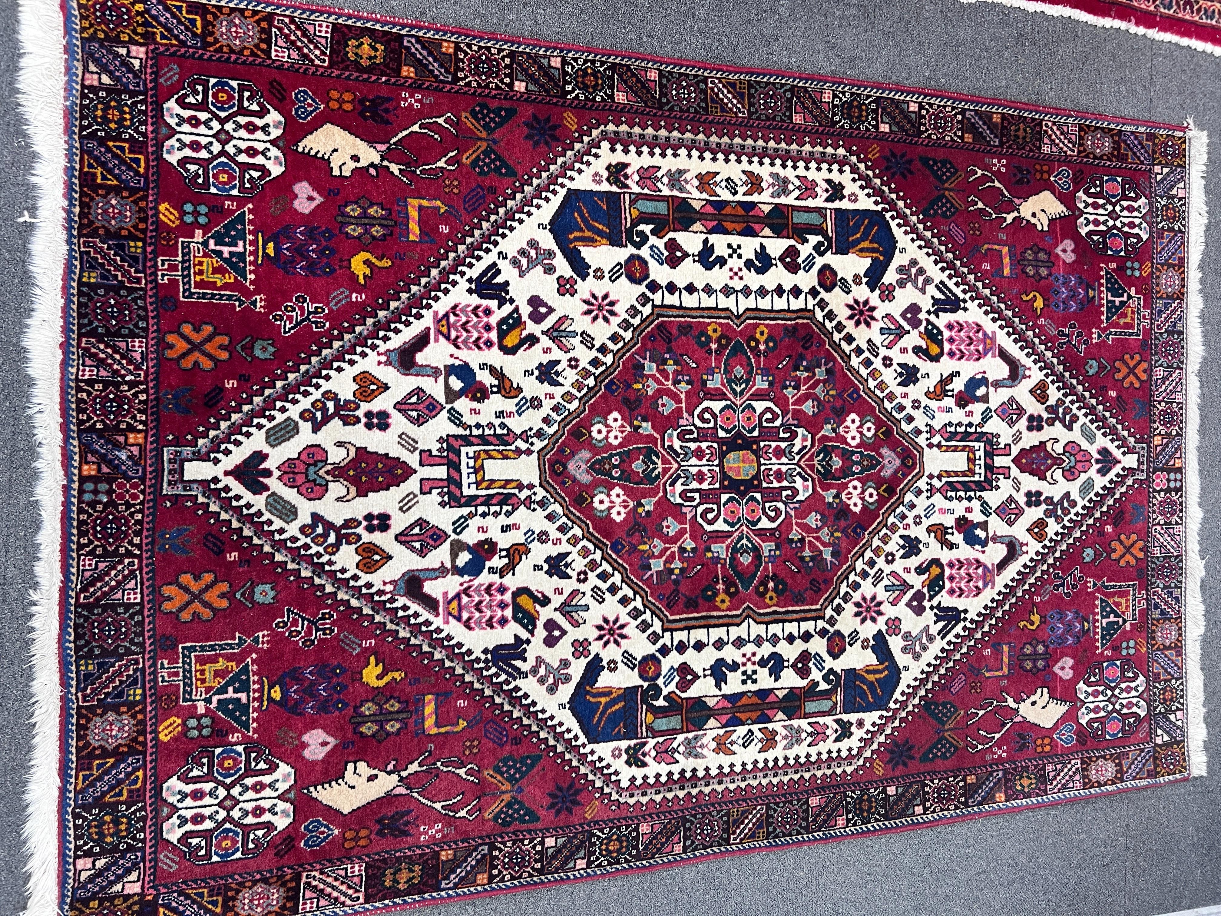 A small red ground rug, 155 x 103cm *Please note the sale commences at 9am.